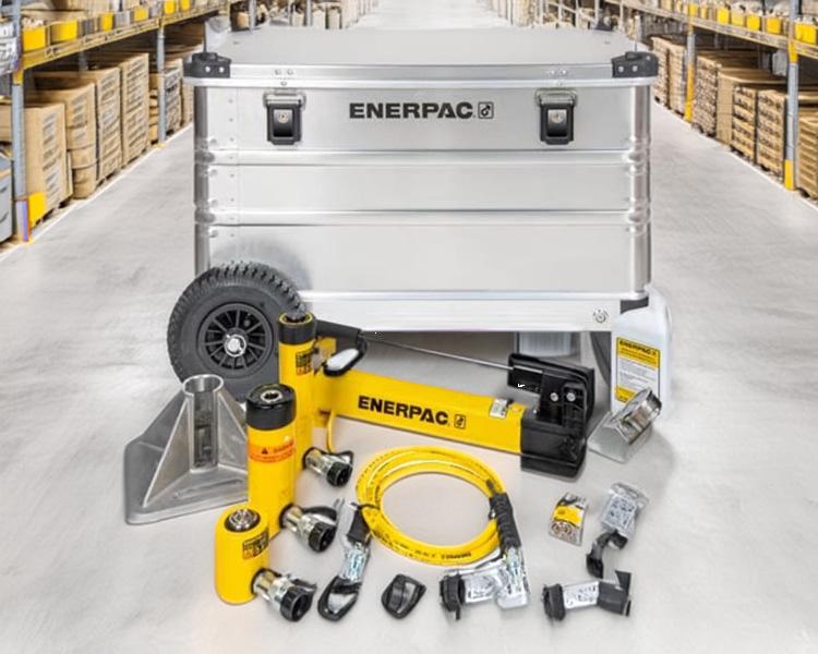 A large steel enerpac box kit. Contains a handpump, two cylinders and various accesssories.